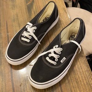 Black Vans sneakers